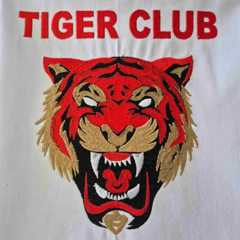 Tiger embroidery on the back (Romaniuk)