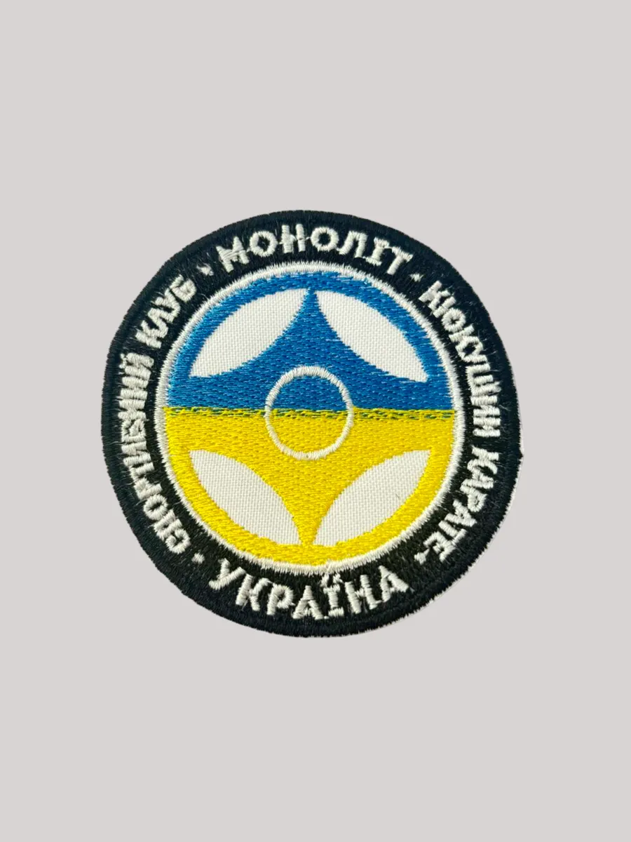 Шеврон клубу МОНОЛІТ
